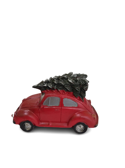 Auto innevata con abete rosso e luce LED