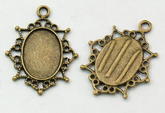 MEDAGLIONE BRONZO ANTICO, 37X24MM, OVALE