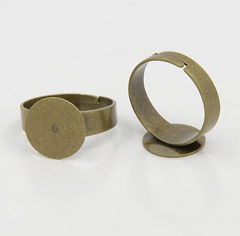 ANELLO CON BASE PIATTA, BRONZO ANTICO